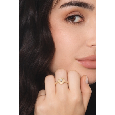 Bague centrale en or jaune avec diamants