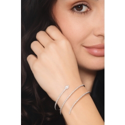 Bracelet ressort en or 18k avec un diamant taille poire et brillants 2