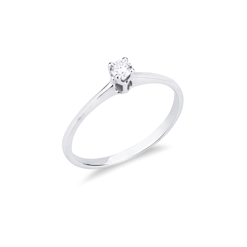 Bague solitaire en or blanc 18k à quatre griffes avec diamant ct. 0,10
