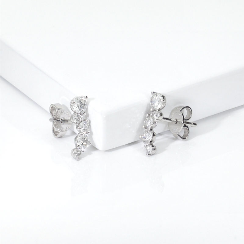 Boucles d’oreilles or blanc 18k design floral avec diamants