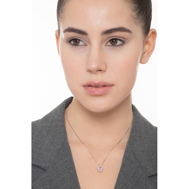 Collier en or blanc 18k avec pendentif orné d’un saphir rose