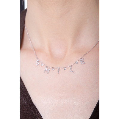 Collier avec lettres  SMILE en or blanc 750 et diamants