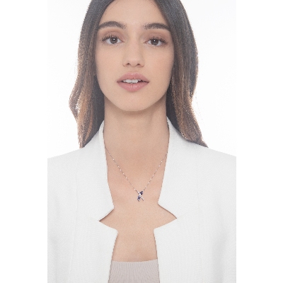 Collier croisé orné de saphirs bleus et diamants or blanc 18k