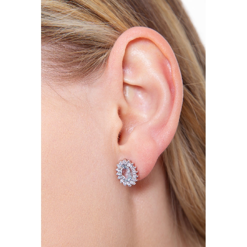 Boucles d'oreilles halo en or blanc 18k avec aigue-marine ovale et diamants 