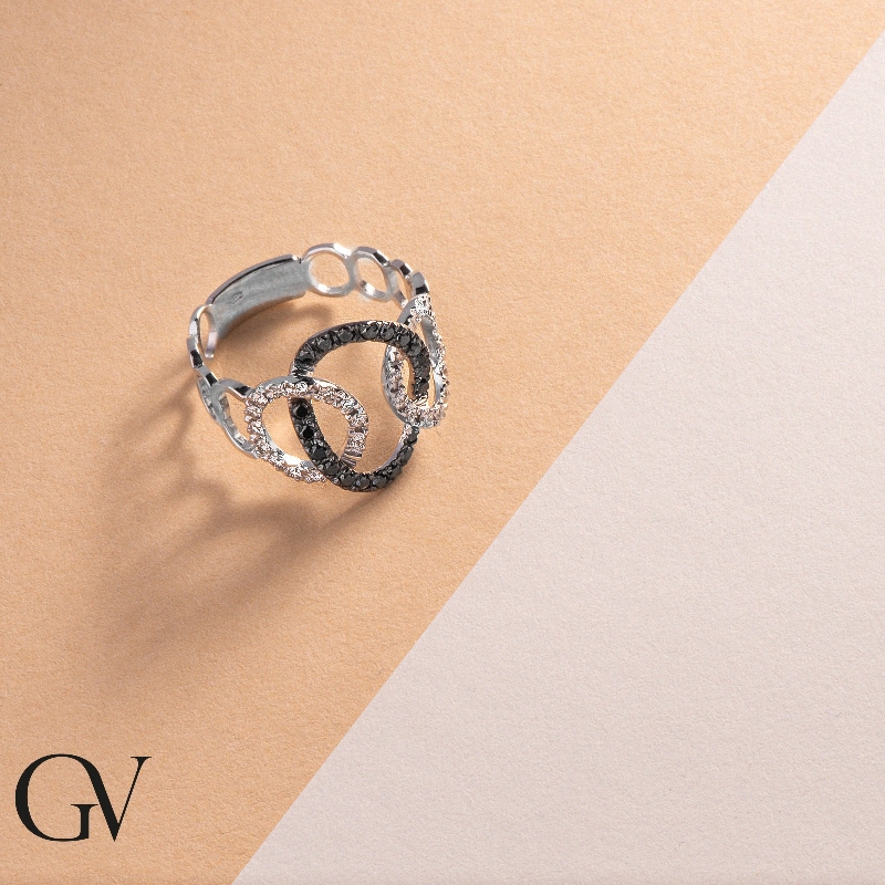 Bague gourmette en or blanc 18k avec diamants noirs et blancs