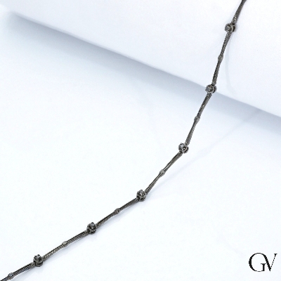 Bracelet alterné en or bruni 18 carats avec diamants noirs