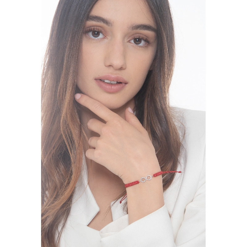 Bracelet avec symbole infini en or blanc 18k et diamants