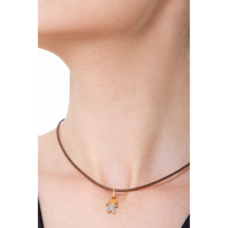 Pendentif enfant en or jaune 18k avec pavé de zircons